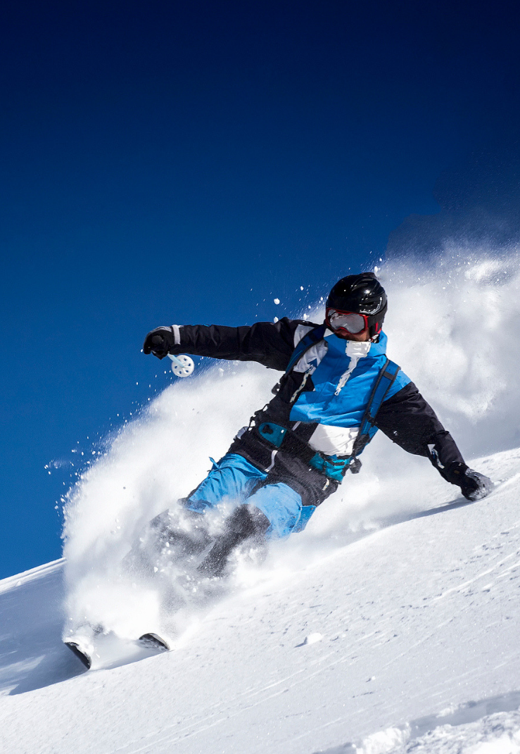 snowboarder shredding the slopes